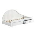 **Lit enfant avec rangement intégré, design épuré et tête de lit arrondie**